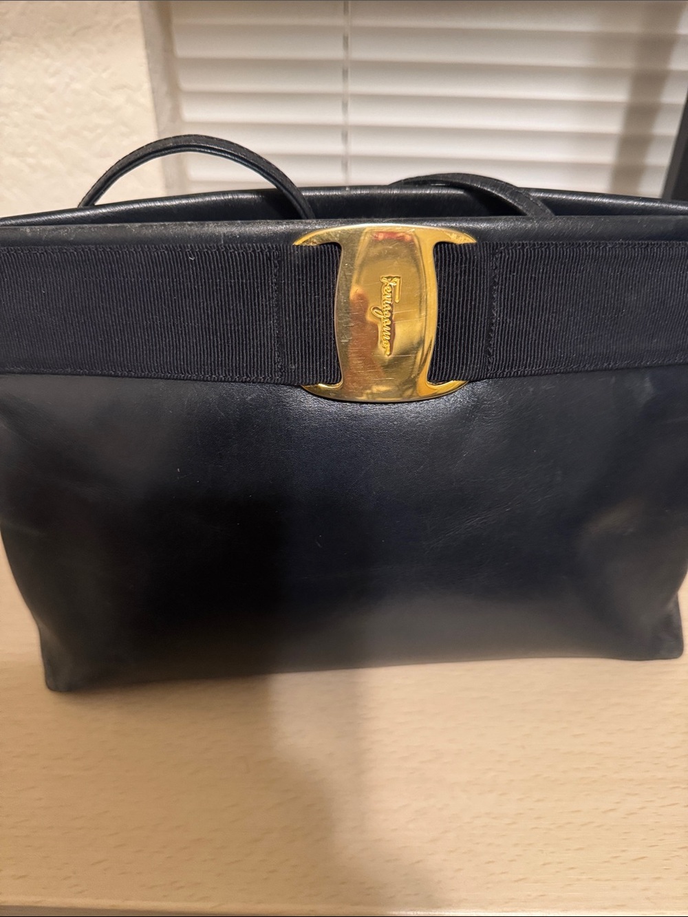 Salvatore Ferragamo Black Leather Long Strap/Clutch Bag with Gold Bow Accent